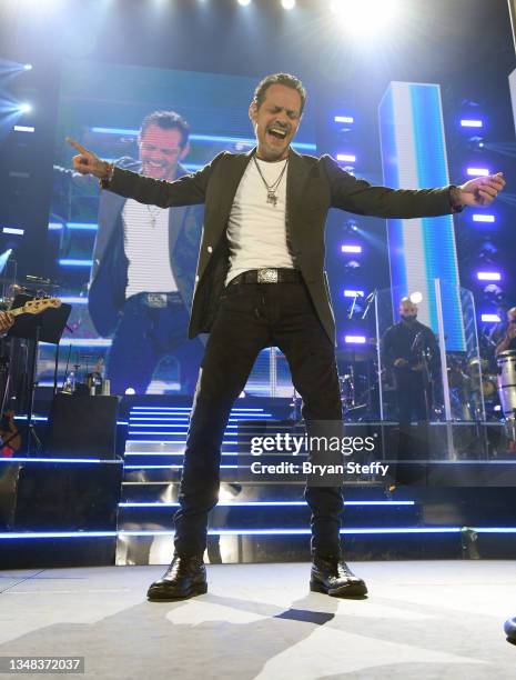 Singer Marc Anthony performs during a stop of his Pa'lla Voy tour at Michelob ULTRA Arena on October 23, 2021 in Las Vegas, Nevada.