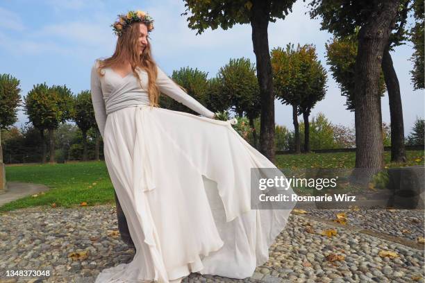 fairy bride on a windy day - ambivere stock pictures, royalty-free photos & images