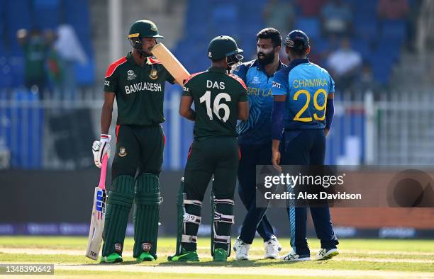 Lahiru Kumara of Sri Lanka clashed with Liton Das of Bangladesh following the wicket during the ICC Men's T20 World Cup match between Sri Lanka and...