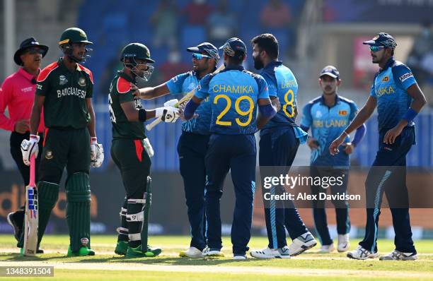 Lahiru Kumara of Sri Lanka clashes with Liton Das of Bangladesh following the wicket during the ICC Men's T20 World Cup match between Sri Lanka and...