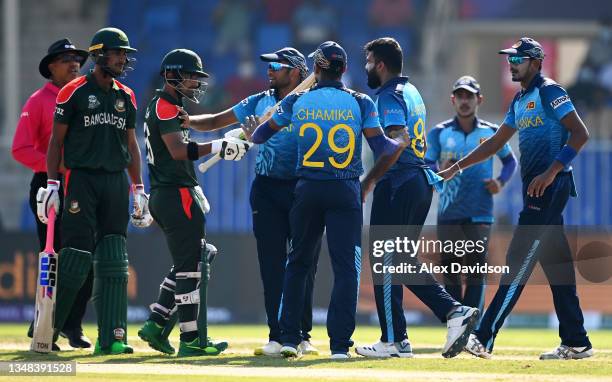 Lahiru Kumara of Sri Lanka clashes with Liton Das of Bangladesh following the wicket during the ICC Men's T20 World Cup match between Sri Lanka and...