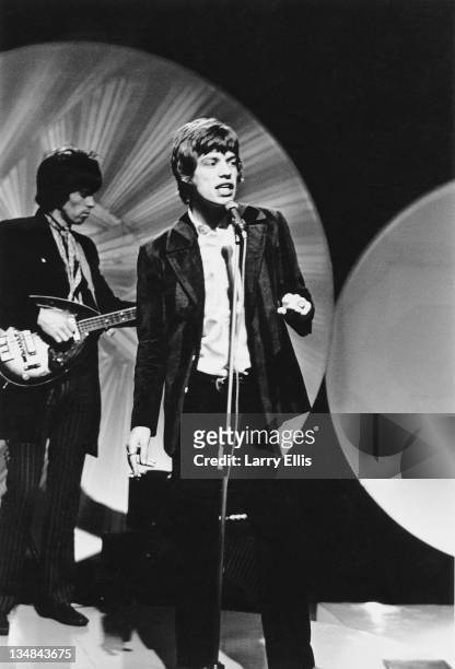 Mick Jagger and Keith Richards performing with the Rolling Stones on the Eamonn Andrews TV show, 6th February 1967.