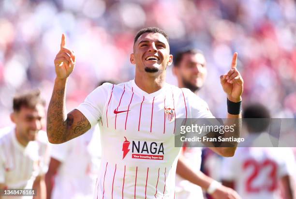 Diego Carlos of Sevilla FC celebrates after scoring their sides third goal during the LaLiga Santander match between Sevilla FC and Levante UD at...