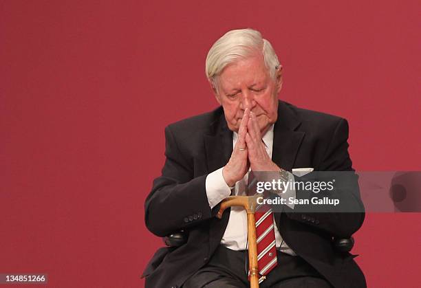 Former German Chancellor Helmut Schmidt gestures to applause from supporters after speaking at the annual federal congress of the German Social...