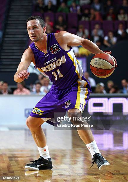 Aaron Bruce of the Kings pushes forward during the round nine NBL match between the Sydney Kings and the Cairns Taipans at Sydney Entertainment...