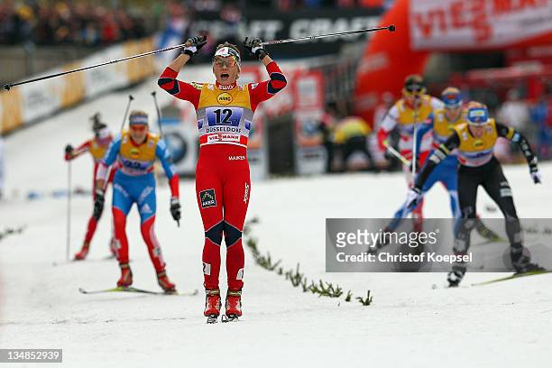 Maiken Caspersen of Norway celebrates their victory after winning the 6x 0,8 kilometer women's team sprint of the FIS Cross Country World Cup at the...