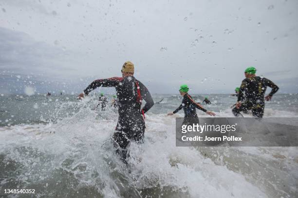 Athletes compete in the swim leg of the IRONMAN 70.3 Sardegna on October 24, 2021 in Cagliari, Italy.