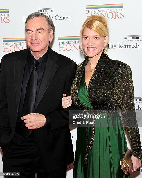 Neil Diamond and Katie McNeil arrive for the formal Artist's Dinner honoring the recipients of the 2011 Kennedy Center Honors hosted by United States...