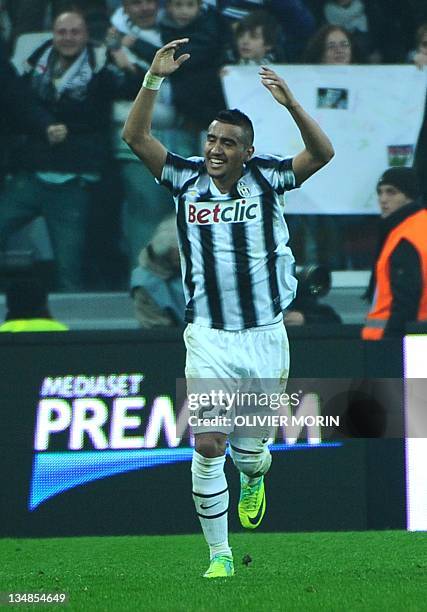 Juventus' midfielder of Chile Arturo Vidal celebrates after scoring during the Italian Serie A football match Juventus against Cesena on December 4,...