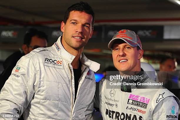 German football player Michael Ballack of Bayer 04 Leverkusen and formula one driver Michael Schumacher pose during day two of the race of champions...