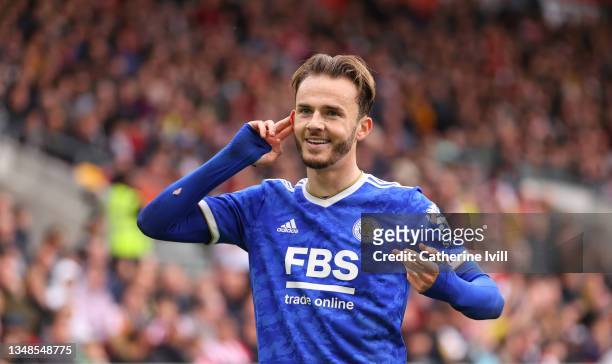 James Maddison of Leicester City celebrates after scoring their side's second goal during the Premier League match between Brentford and Leicester...