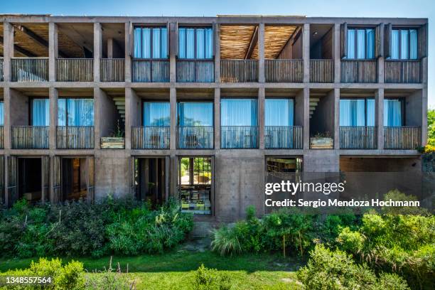 a beautiful boutique spa hotel resort in tepoztlan, mexico under a blue summer sky - cuernavaca stockfoto's en -beelden