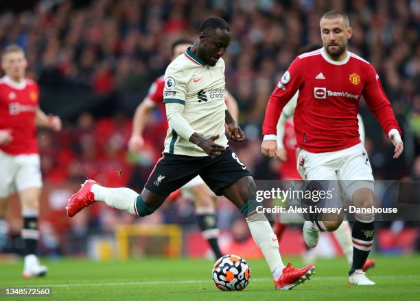 Naby Keita of Liverpool scores his teams first goal during the Premier League match between Manchester United and Liverpool at Old Trafford on...