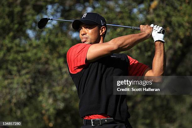 Tiger Woods hits his tee shot on the sixth hole during the final round of the Chevron World Challenge at Sherwood Country Club on December 4, 2011 in...