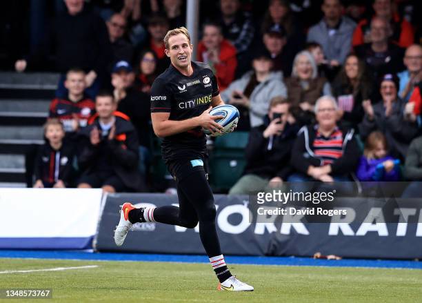 Max Malins of Saracens breaks to score his third try during the Gallagher Premiership Rugby match between Saracens and Wasps at StoneX Stadium on...