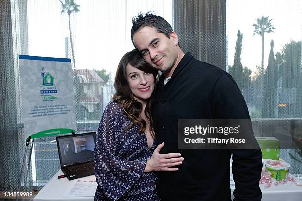 Actress Lindsay Sloane and Dar Rollins attends the Working Elves' First Annual Santa's Secret Workshop Benefitting LA Family Housing at Andaz Hotel...
