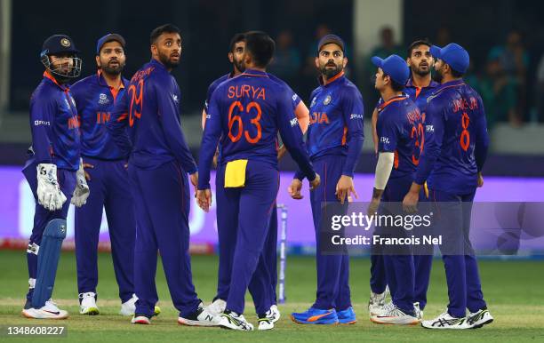 Virat Kohli of of India looks on during a review during the ICC Men's T20 World Cup match between India and Pakistan at Dubai International Stadium...