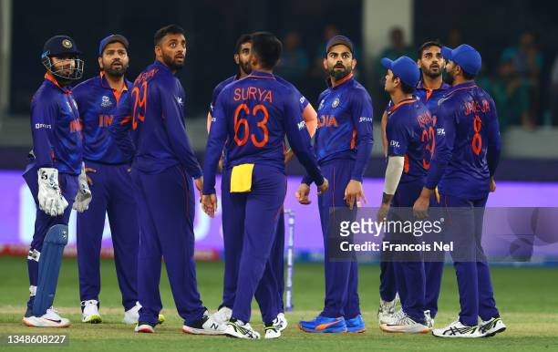 Virat Kohli of of India looks on during a review during the ICC Men's T20 World Cup match between India and Pakistan at Dubai International Stadium...