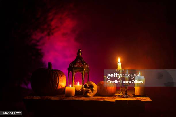scary halloween table with foggy background - spooky stock pictures, royalty-free photos & images