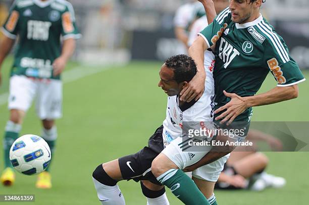 Liedson of Corinthians and Henrique of Palmeiras during the match between Corinthians Palmeiras as part of round 38 of the Serie A Brazil in Pacaembu...