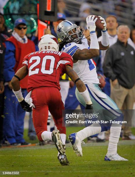 Tony Romo pass to Dallas Cowboys wide receiver Jesse Holley is good for 13 yards and a first down in the fourth quarter against Arizona Cardinals...
