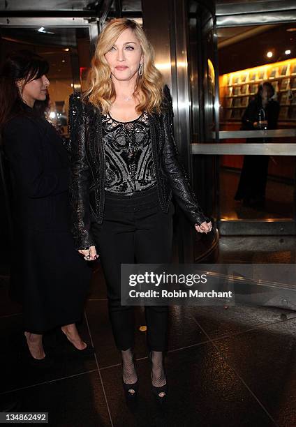 Madonna attends the Cinema Society & Piaget screening of "W.E." at The Museum of Modern Art on December 4, 2011 in New York City.