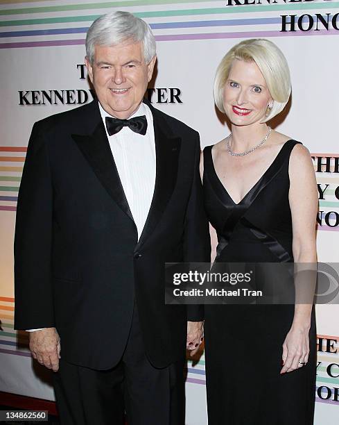 Newt Gingrich and wife, Callista Gingrich arrive at the 34th Kennedy Center Honors held at the Kennedy Center Hall of States on December 4, 2011 in...