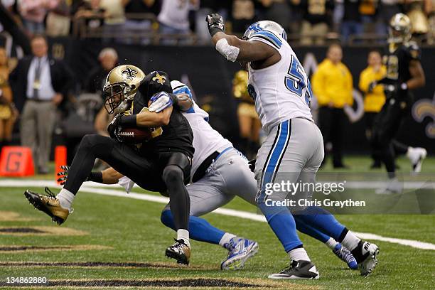 Wide receiver Lance Moore of the New Orleans Saints catches a touchdown in the second quarter against the Detroit Lions at Mercedes-Benz Superdome on...
