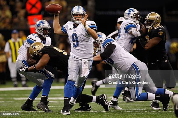 Quarterback Matthew Stafford of the Detroit Lions looks to pass against the New Orleans Saints in the third quarter at Mercedes-Benz Superdome on...