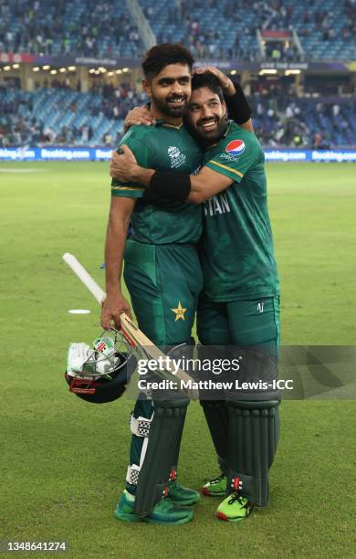Mohammad Rizwan and Babar Azam of Pakistan celebrate after winning by 10 wickets following the ICC Men's T20 World Cup match between India and...