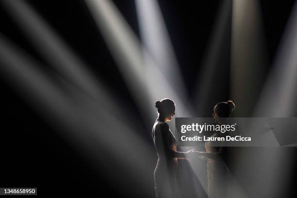 Anchilee Scott-Kemmis and Tharina Botes wait to hear the final results during the 22nd Miss Universe Thailand pageant at Nong Nooch Tropical Garden...