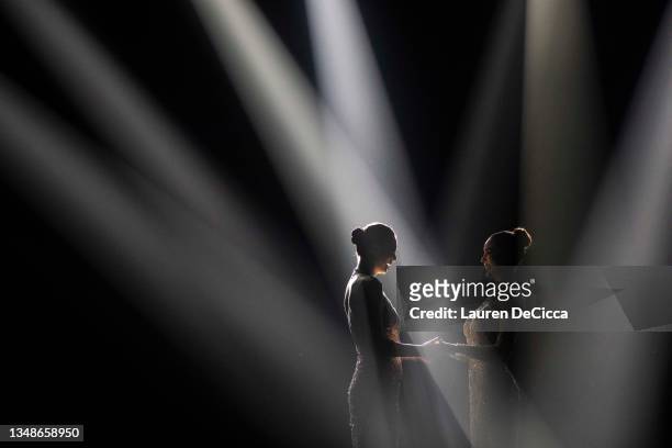 Anchilee Scott-Kemmis and Tharina Botes wait to hear the final results during the 22nd Miss Universe Thailand pageant at Nong Nooch Tropical Garden...