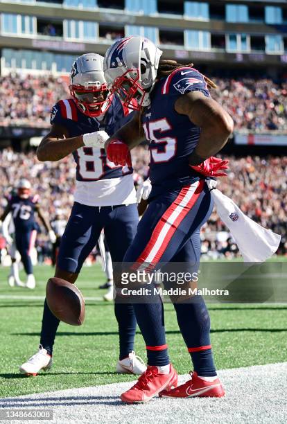 Brandon Bolden of the New England Patriots celebrates after scoring a touchdown during the second quarter in the game against the New York Jets at...