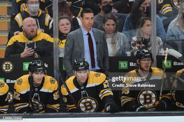 Assistant Coach, Chris Kelly of the Boston Bruins watches the third period against the San Jose Sharks at the TD Garden on October 24, 2021 in...