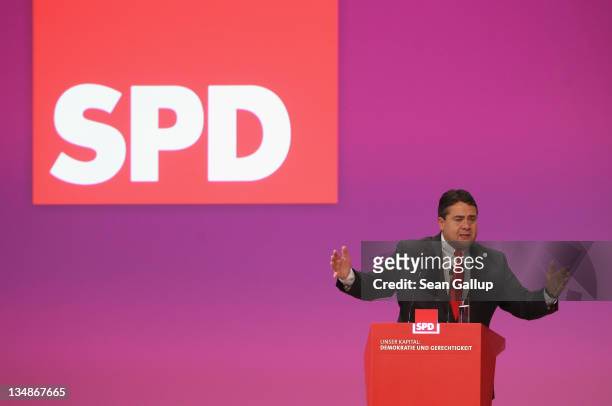 Sigmar Gabriel, Chairman of the German Social Democrats , speaks on the second day of the SPD annual federal congress on December 5, 2011 in Berlin,...