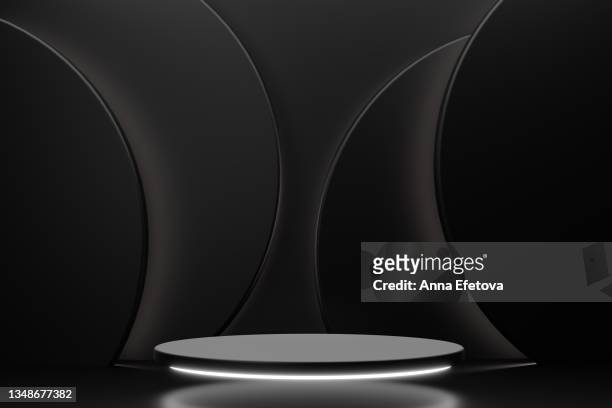luxury round black podium with white backlighting on abstract black background with many black circles. perfect platform for showing your products. three dimensional illustration - sports round stock-fotos und bilder