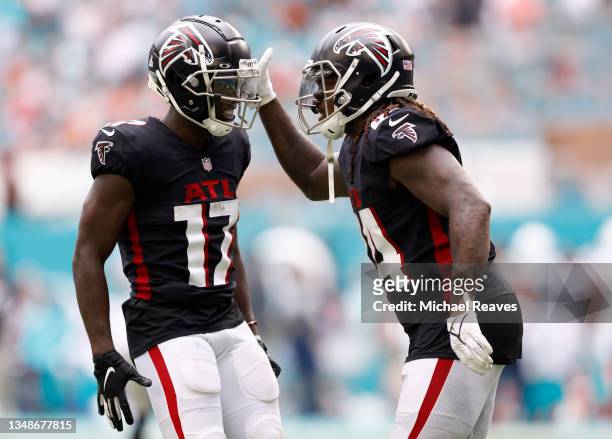 Cordarrelle Patterson of the Atlanta Falcons celebrates with Olamide Zaccheaus after a touchdown during the fourth quarter in the game against the...