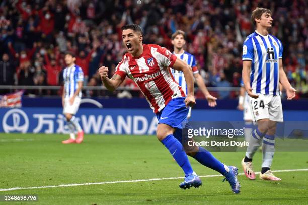 Luis Suarez of Atletico Madrid celebrates after scoring their side's first goal during the LaLiga Santander match between Club Atletico de Madrid and...
