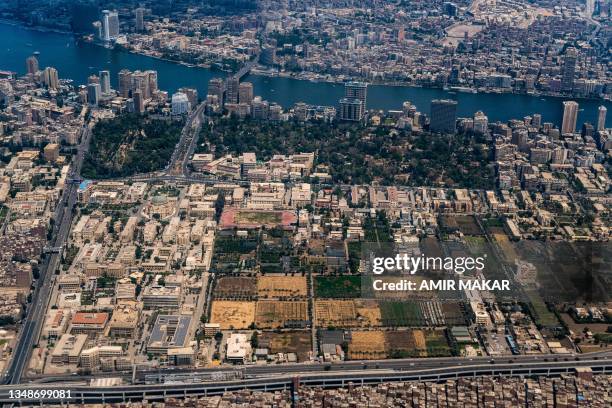 This aerial view taken on April 28, 2023 shows the Cairo University campus in Giza, the twin-city of Egypt's capital, and the surrounding environs,...