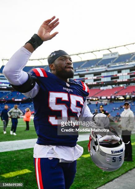 Josh Uche of the New England Patriots waves to fans after the game against the New York Jets at Gillette Stadium on October 24, 2021 in Foxborough,...