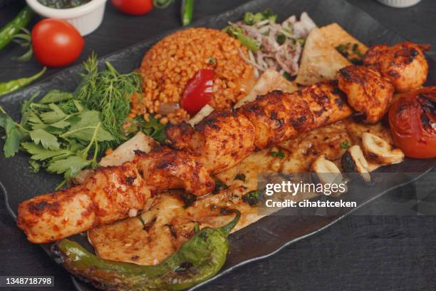chicken skewer.black background - tartar sauce overhead stock pictures, royalty-free photos & images