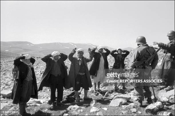 French soldiers arrest civilians during "Operation Bigeard" in March 1956, when an armed outbreak in Souk-Ahras, South of Constantine region,...