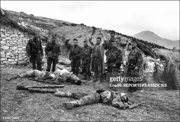 French soldiers looking at dead bodies during "Operation Bigeard" in March 1956, when an armed outbreak in Souk-Ahras, South of Constantine region,...