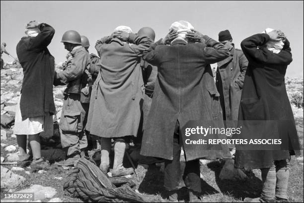 French soldiers arrest civilians during "Operation Bigeard" in March 1956, when an armed outbreak in Souk-Ahras, South of Constantine region,...