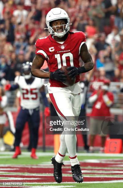 DeAndre Hopkins of the Arizona Cardinals celebrates after scoring a touchdown in the second quarter against the Houston Texans in the game at State...