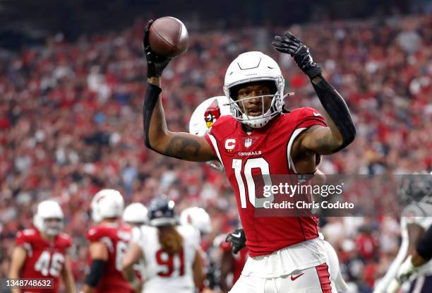 DeAndre Hopkins of the Arizona Cardinals celebrates after scoring a touchdown in the second quarter against the Houston Texans in the game at State...