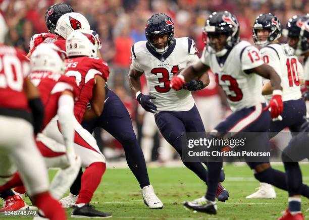 David Johnson of the Houston Texans runs with the ball in the second quarter against the Arizona Cardinals in the game at State Farm Stadium on...