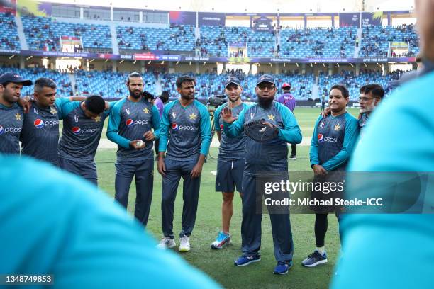 Saqlain Mushtaq the Head Coach of Pakistan addresses his team ahead of the ICC Men's T20 World Cup match between India and Pakistan at Dubai...