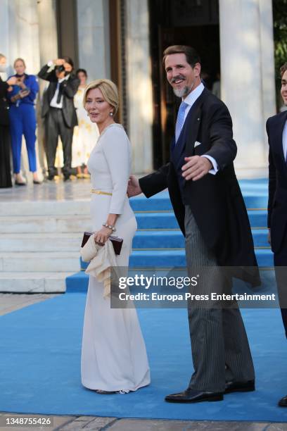 Paul of Greece, brother of the groom, and Marie-Chantal Miller attend the Wedding of Philippos of Greece and Nina Flohr on October 23, 2021 in...