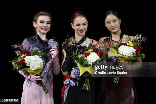 Daria Usacheva of Russia , Alexandra Trusova of Russia and Young You of Korea stand on the podium with thier medals after competing in the Womens...